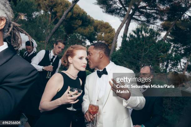 Actor Will Smith and Jessica Chastain wearing a Prada dress are photographed for Paris Match whilst attending the Amfar Gala at the Eden Roc Hotel on...