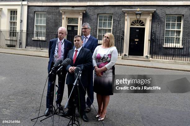 Robin Swann, Leader of the Ulster Unionist Party, stands with colleagues as he speaks to the media outside 10 Downing Street on June 15, 2017 in...