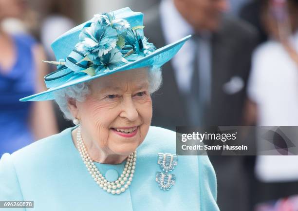 Queen Elizabeth II visits Mayflower Primary School during an official visit to Tower Hamlets on June 15, 2017 in London, England. The visit coincides...