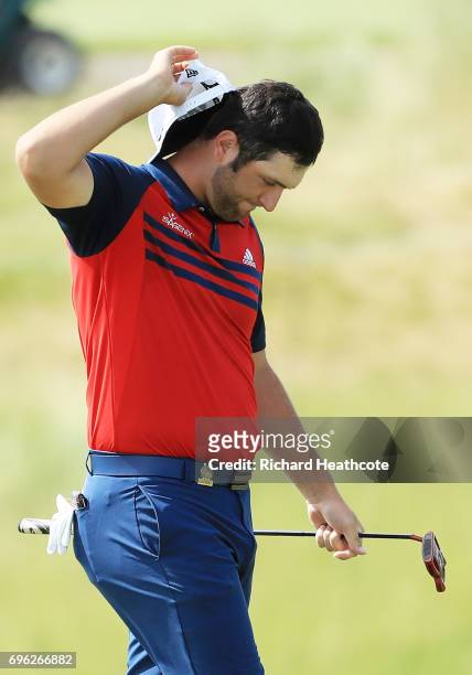 Jon Rahm of Spain reacts after puttig off the 17th green during the first round of the 2017 U.S. Open at Erin Hills on June 15, 2017 in Hartford,...