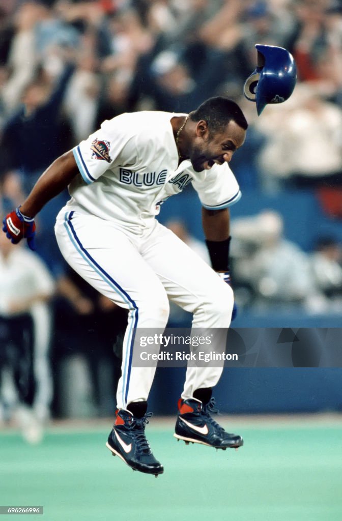 Joe Carter jumps for joy after his walkoff three-run homer to win the 1993 World Series...