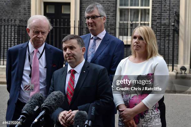 Robin Swann, Leader of the Ulster Unionist Party, stands with colleagues as he speaks to the media outside 10 Downing Street on June 15, 2017 in...