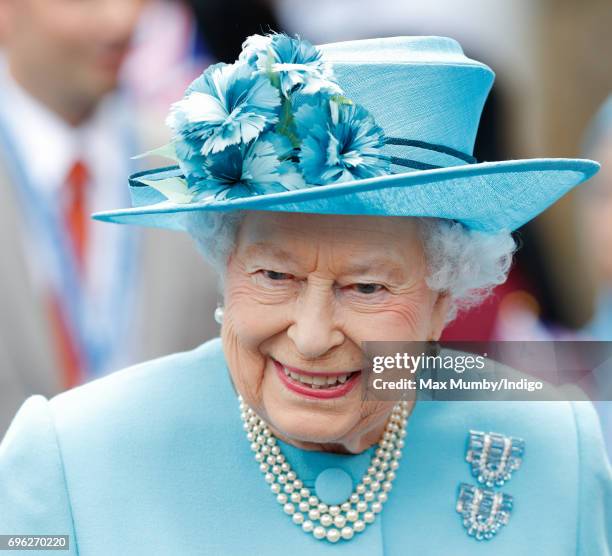 Queen Elizabeth II visits Mayflower Primary School during a day of engagements in Tower Hamlets commemorating the centenary of the bombing of Upper...