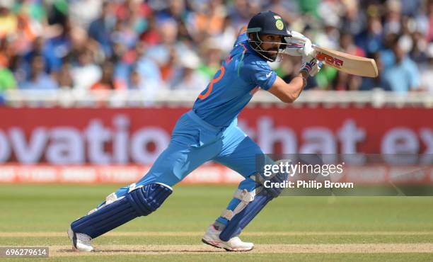 Virat Kohli of India hits out during the ICC Champions Trophy match between Bangladesh and India at Edgbaston cricket ground on June 15, 2017 in...