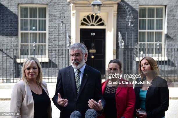 Gerry Adams, President of Sinn Féin and Michelle O'Neill, leader of Sinn Féin stand with colleagues as they speak to the media outside 10 Downing...