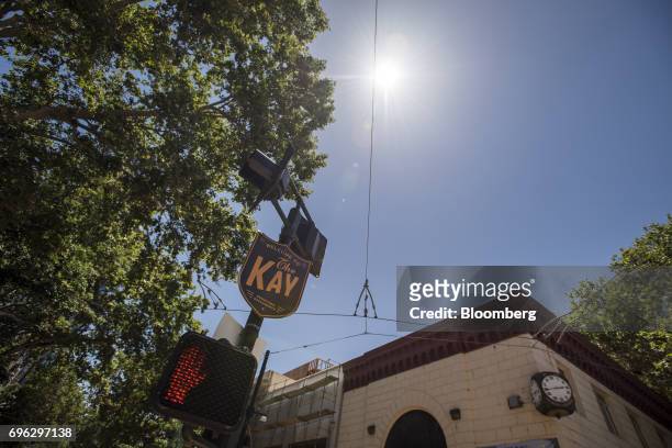 Street sign is displayed in the downtown area of Sacramento, California, U.S., on Tuesday, June 6, 2017. As the cost of daily life tests the bounds...