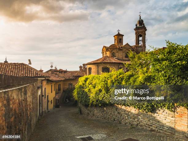 old medieval town of neive. cuneo, italy. - alba italy stock pictures, royalty-free photos & images