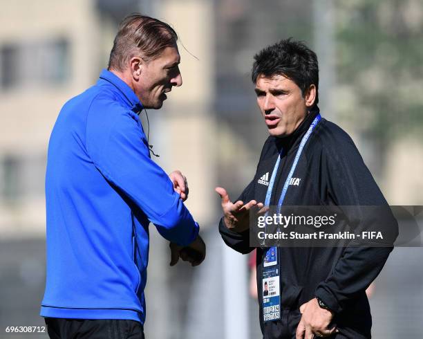 Massimo Busacca, FIFA head of Refeering talks with a referee at training session of Video Assistant Referees on June 15, 2017 in St. Petersburg,...