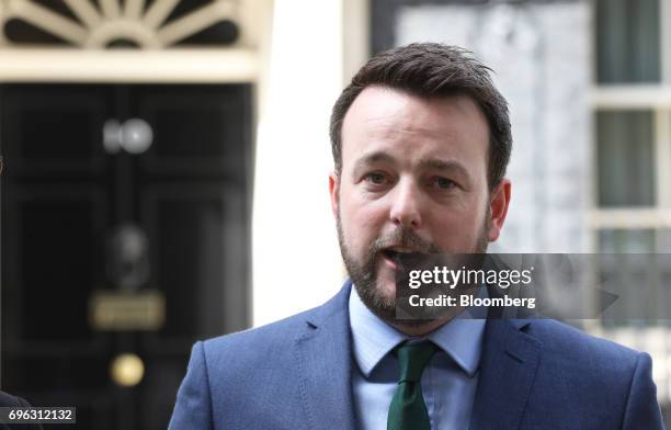 Colum Eastwood, leader of the Social Democratic and Labour Party, speaks to the media outside number 10 Downing Street in London, U.K., on Thursday,...