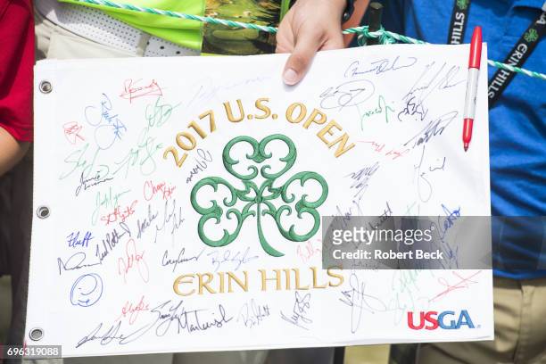 View of signatures on a spectator's flag during Wednesday practice at Erin Hills GC. Hartford, WI 6/14/2017 CREDIT: Robert Beck