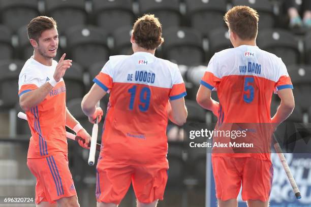 Robbert Kemperman of the Netherlands celebrates scoring his sides fourth goal with Bob de Voogd of the Netherlands and Thijs van Dam of the...