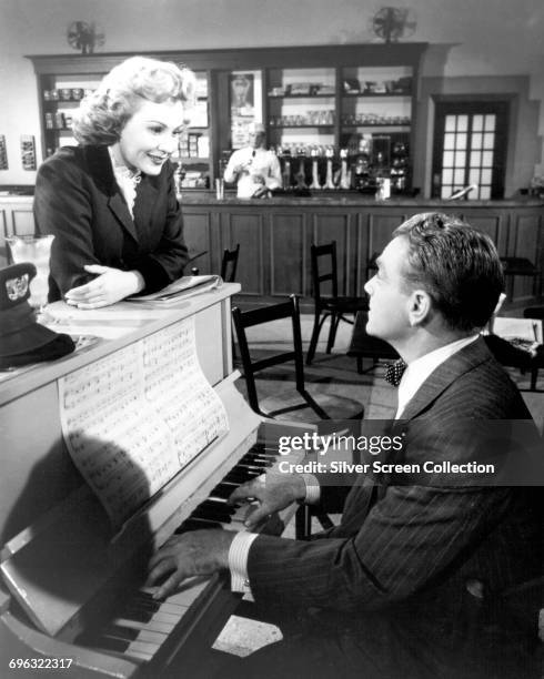 Actors James Cagney as Arthur 'Cody' Jarrett and Virginia Mayo as Verna Jarrett in the film noir 'White Heat', 1949.