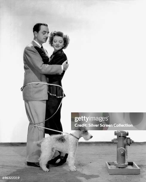 Actors William Powell as Nick Charles and Myrna Loy as Nora Charles in a publicity still for the film 'The Thin Man', 1934.