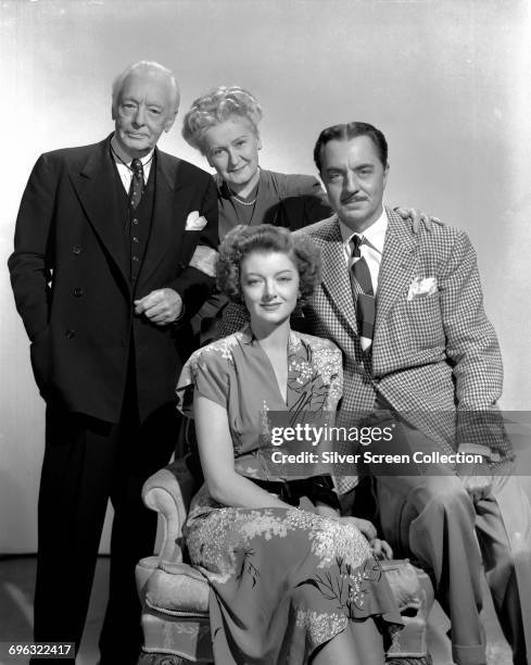 From left to right, actors Harry Davenport as Bertram Charles, Lucile Watson as Mrs Charles, William Powell as Nick Charles and Myrna Loy as Nora...
