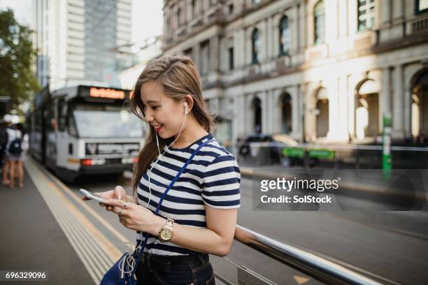 waiting for the tram - melbourne australia stock pictures, royalty-free photos & images