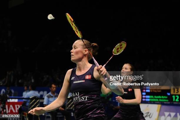 Kamilla Rytter Juhl and Christinna Pedersen of Denmark compete against Poon Lok Yan and Tse Ying Suet of Hong Kong during Womens Double Round 2 match...