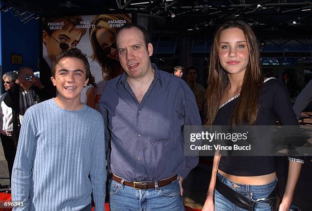 Actors Frankie Muniz , Paul Giamatti and Amanda Bynes attend the premiere of the film Big Fat Liar February 2, 2002 at Universal Studios in Los...