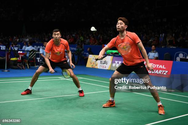 Chai Biao and Hong Wei of China compete against Lee Jhe-Huei and Lee Yang of Chinese Taipei during Mens Double Round 2 match of the BCA Indonesia...