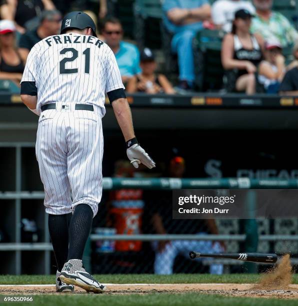 Todd Frazier of the Chicago White Sox throws his bat after striking out against the Baltimore Orioles to end the third inning at Guaranteed Rate...