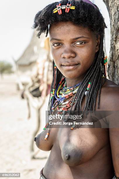 Portrait of a zemba woman. Zembas are a bantu tribe family of the Himbas who migrated into what today is Namibia a few centuries ago. They presumably...