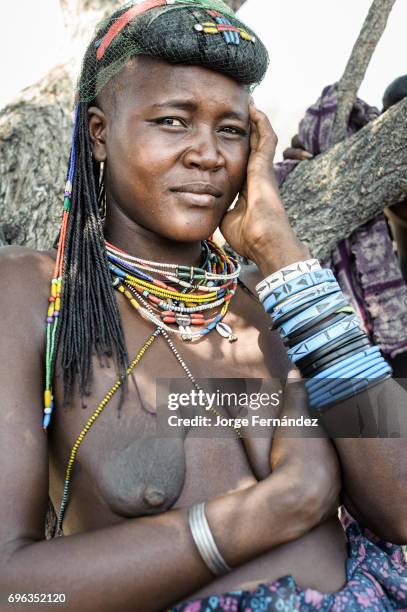 Portrait of a zemba woman. Zembas are a bantu tribe family of the Himbas who migrated into what today is Namibia a few centuries ago. They presumably...