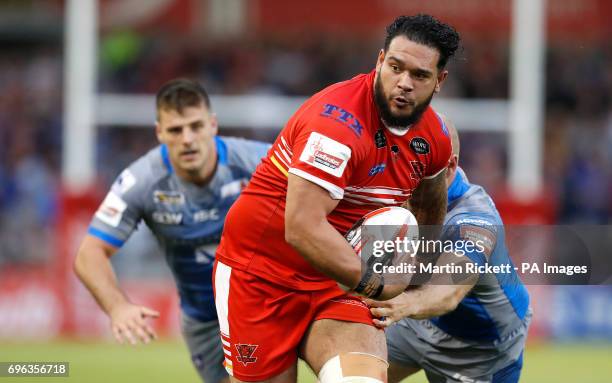 Salford Red Devils' Ben Murdoch-Masila skips away from a tackle by Wakefield Trinity's Liam Finn, during the Ladbrokes Challenge Cup, quarter-final...