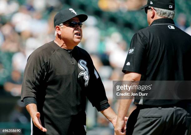 Manager Rick Renteria argues with and is ejected by first base umpire Paul Emmel after Avisail Garcia was ejected during the fifth inning against the...