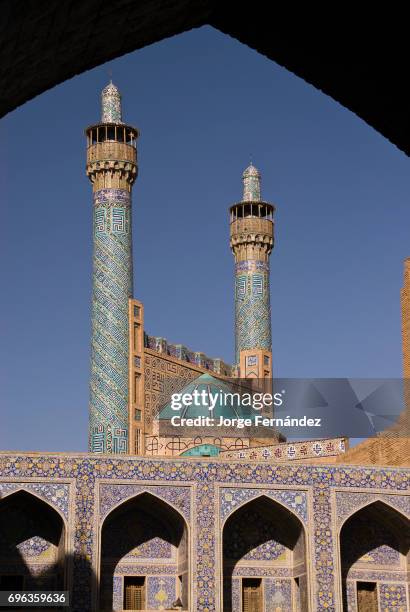 Iman s mosque minarets Isfahan Iran View on the Masjid-e Jam 'e Abbasi mosque in the Naghsh-i Jahan Square on a sunny day.