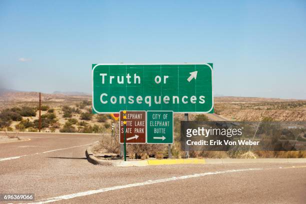 highway exit sign for truth of consequences nm - honesty stock pictures, royalty-free photos & images