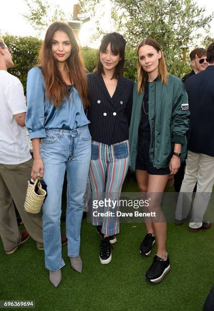 Doina Ciobanu, Betty Bachz and Charlotte de Carle attend Microsoft's Surface Garden Sessions at The Gardening Society on June 15, 2017 in London,...