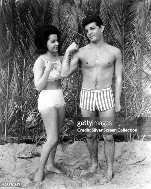 Actors Annette Funicello as Dee Dee and Frankie Avalon as Frankie in the film 'Muscle Beach Party', 1964.