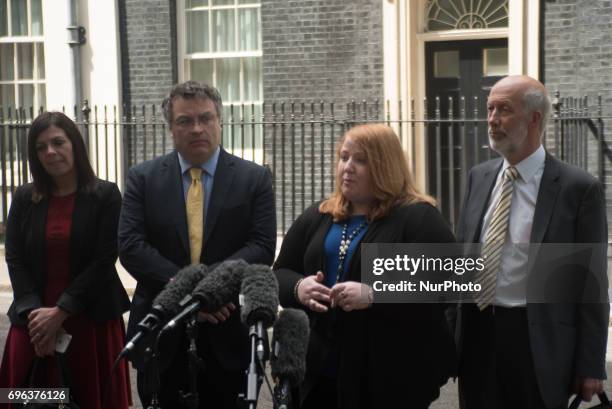 Naomi Long, leader of the Alliance Party of Northern Ireland stands with colleagues as she speaks outside Downing Street, London on June 15, 2017....