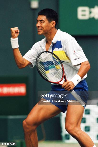 Shuzo Matsuoka of Japan celebrates a point in his Singles first round match against Henrik Holm of Sweden during the Japan Open Tennis Championships...