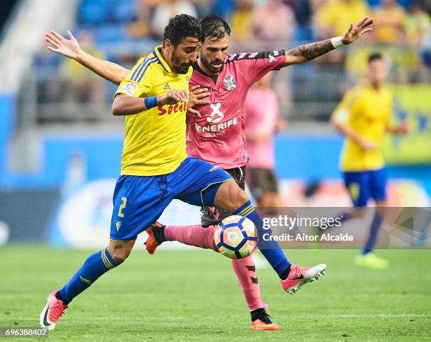 Javier Carpio of Cadiz FC competes for the ball with Tyronne del Pino of CD Tenerife during La Liga Segunda Division between Cadiz CF and CD Tenerife...