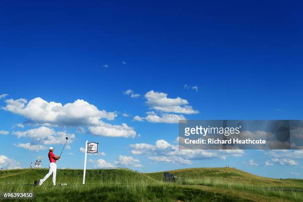 Jason Day of Australia plays his shot from the 14th tee during the first round of the 2017 U.S. Open at Erin Hills on June 15, 2017 in Hartford,...
