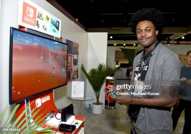 Actor Echo Kellum plays Super Mario Odyssey at the Nintendo booth at the 2017 E3 Gaming Convention at Los Angeles Convention Center on June 15, 2017...