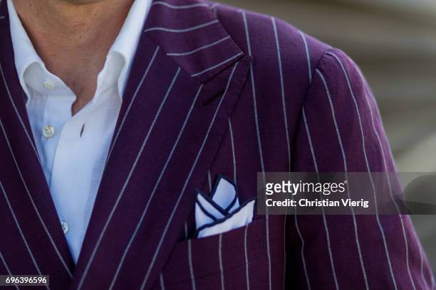 Roman Zaczkiewicz wearing a purple made to measure suit, double breasted suit, button down shirt white linen shirt, cotton pocket square, black penny...