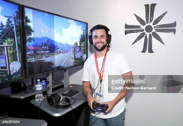 Jack Falahee plays Far Cry 5 during E3 2017 at Los Angeles Convention Center on June 15, 2017 in Los Angeles, California.