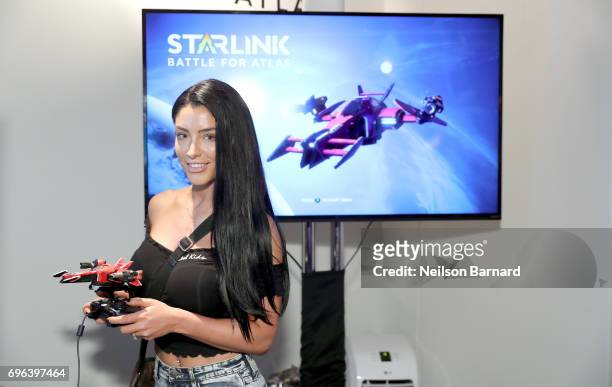 Natalie Eva Marie plays Starlink: Battle for Atlas during E3 2017 at Los Angeles Convention Center on June 15, 2017 in Los Angeles, California.