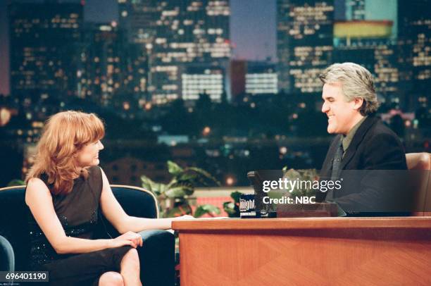 Pictured: Actress Joey Lauren Adams being interviewed by host Jay Leno on January 9, 1998 --