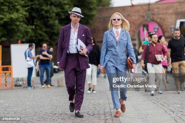 Couple Monika Kaminska wearing bespoke tailoring by Monika Kaminska, sirensuit chalkstripe pattern, fabric: Huddersfield Fine Worsteds, wool linen...