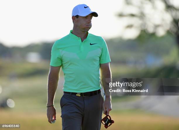 Rory McIlroy of Northern Ireland reacts after finishing on the 18th green during the first round of the 2017 U.S. Open at Erin Hills on June 15, 2017...