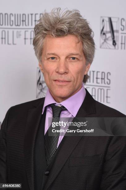 Jon Bon Jovi poses backstage at the Songwriters Hall Of Fame 48th Annual Induction and Awards at New York Marriott Marquis Hotel on June 15, 2017 in...