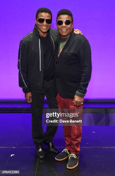 Jackie Jackson and Tito Jackson of 'The Jackson 5' pose with cast members of the West End Production Of "Motown The Musical" at the Shaftesbury...