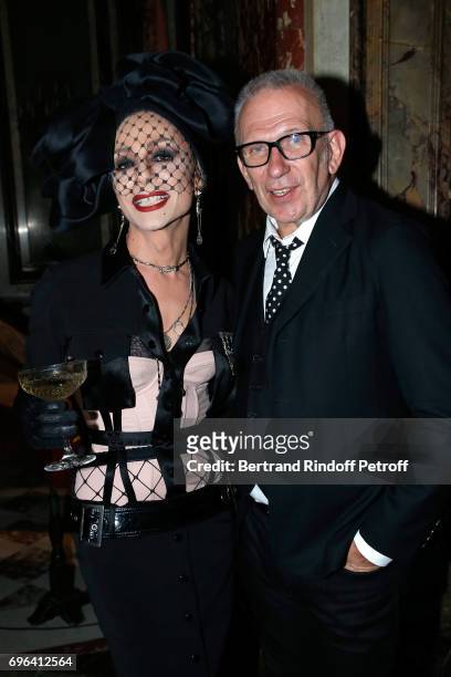 Dancer of the event's show and Jean-Paul Gaultier attend the Jean-Paul Gaultier "Scandal" Fragrance Launch at Hotel de Behague on June 15, 2017 in...