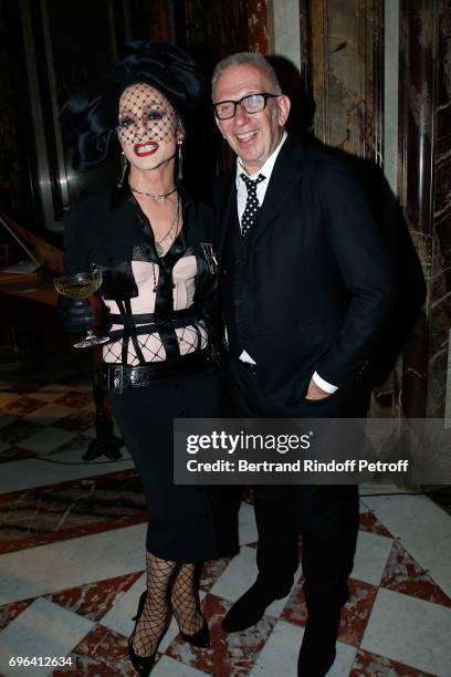 Dancer of the event's show and Jean-Paul Gaultier attend the Jean-Paul Gaultier "Scandal" Fragrance Launch at Hotel de Behague on June 15, 2017 in...