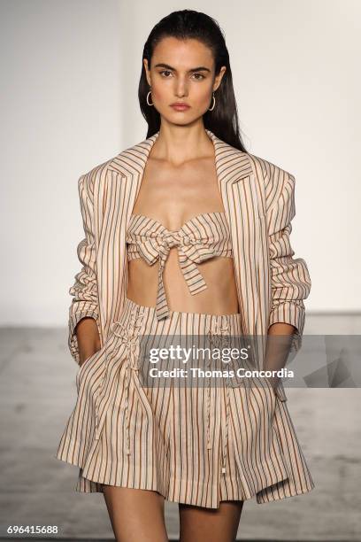 Blanca Padilla walks the runway wearing Zimmermann Resort 2018 at Industria Studios on June 15, 2017 in New York City.