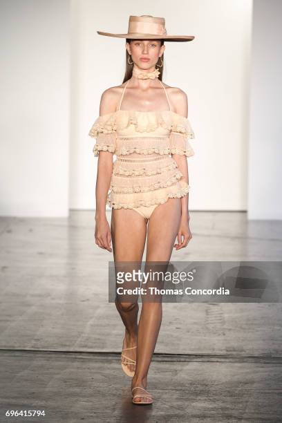 Model walks the runway wearing Zimmermann Resort 2018 at Industria Studios on June 15, 2017 in New York City.