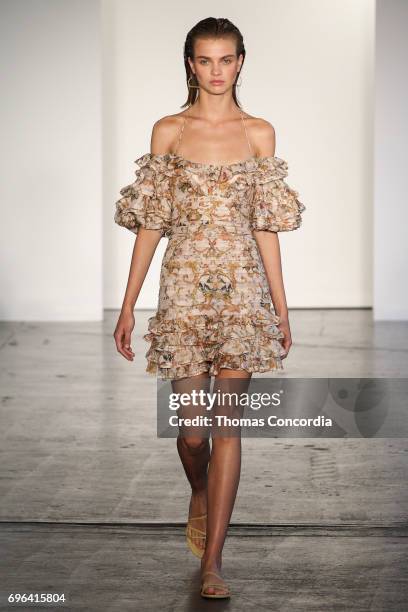 Model walks the runway wearing Zimmermann Resort 2018 at Industria Studios on June 15, 2017 in New York City.