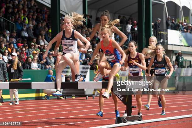 Allie Ostrander of Boise State University and Tori Gerlach of Penn State University lead the pack in the 3000 meter steeplechase during the Division...